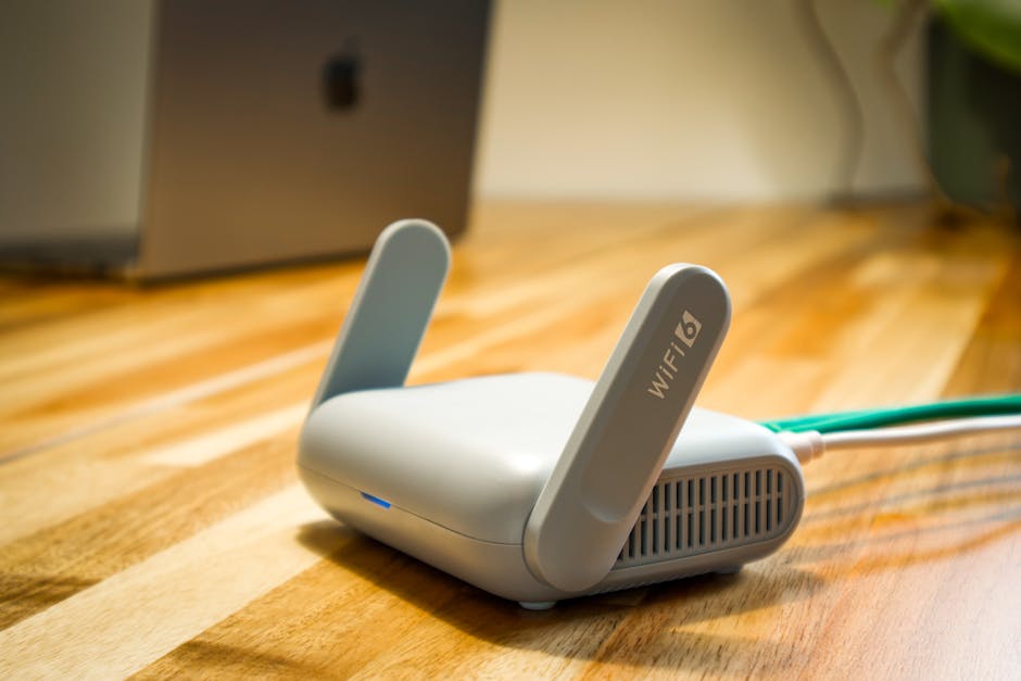 A modern, powerful WiFi router and network equipment neatly installed on a wall, symbolizing a reliable and fast internet infrastructure.